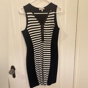 Ladies Black and White Little Black Dress with stripes and zipper detail